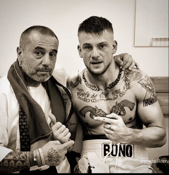Boxeur e uomo del corner dopo un incontro